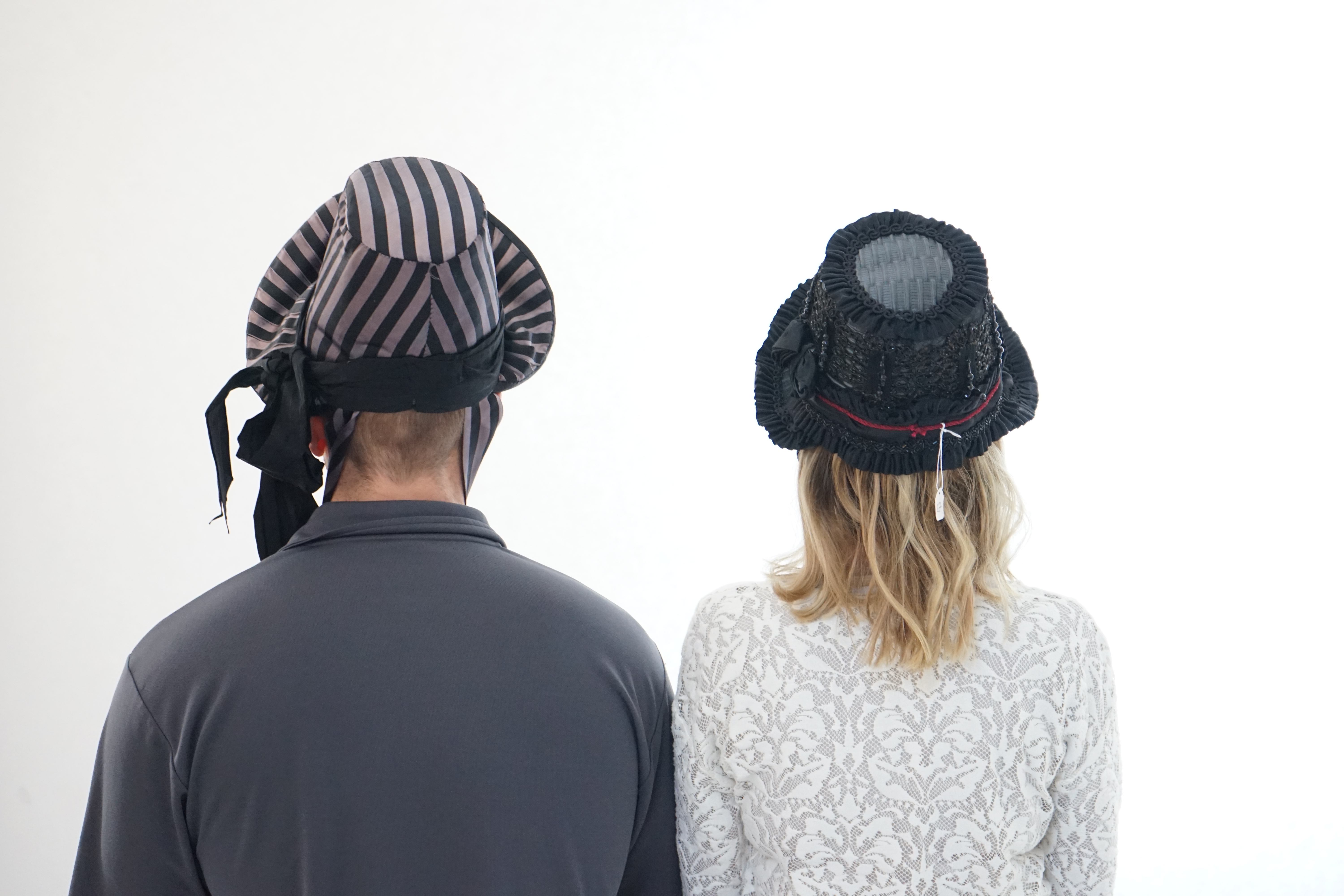 Two lady's Victorian style bonnets, silver and black striped and the other silver black with jet trim. Ex Royal Opera House 'The Damnation of Faust'